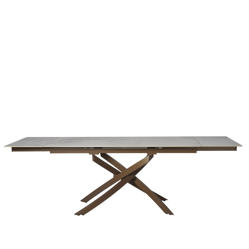 Tavolo Pegaso Pietra Patagonia con gambe bronzo design moderno
