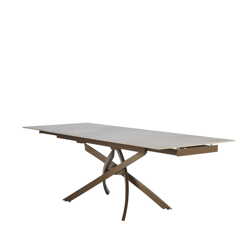 Tavolo Pegaso Pietra Patagonia con gambe bronzo design moderno