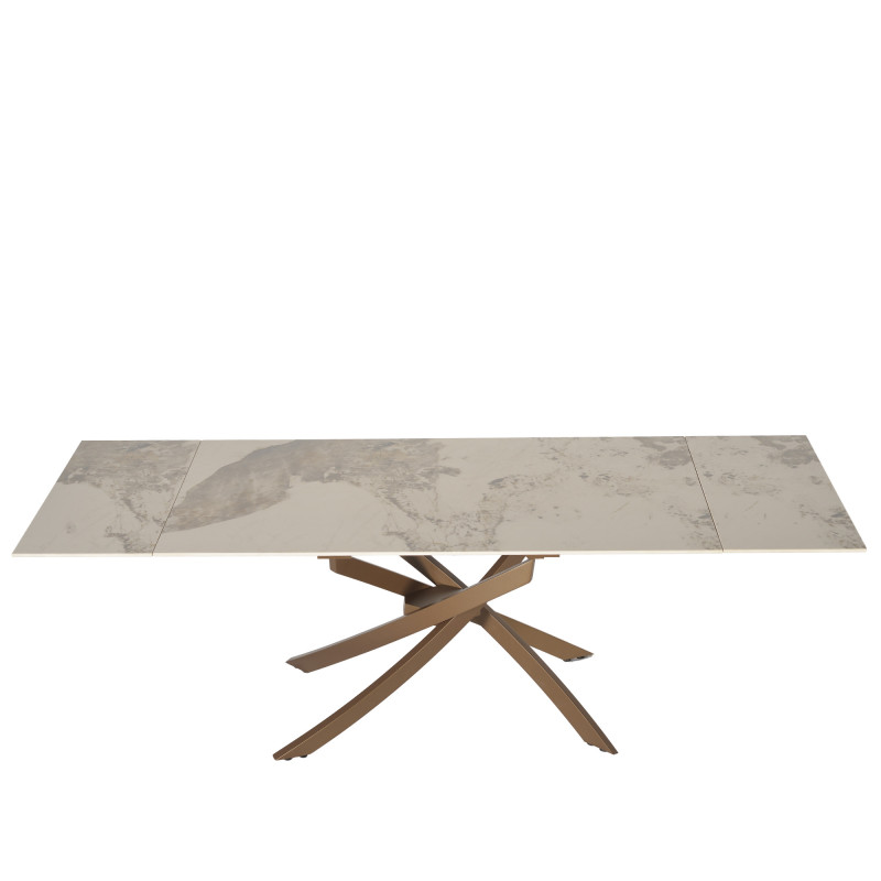 Tavolo Pegaso Pietra Patagonia con gambe bronzo design moderno