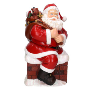 Babbo natale resina in camino rosso cm28,5x32h50,5