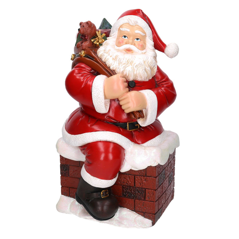 Babbo natale resina in camino rosso cm28,5x32h50,5