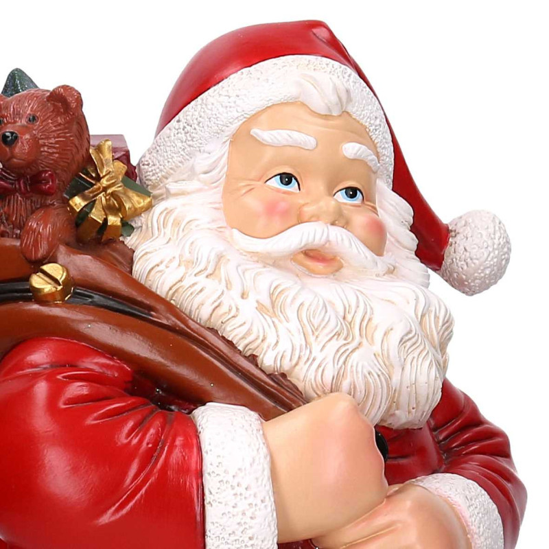 Babbo natale resina in camino rosso cm28,5x32h50,5