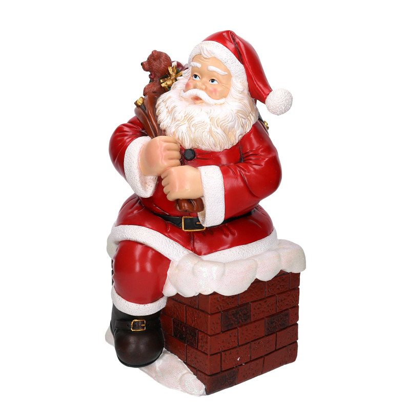 Babbo natale resina in camino rosso cm28,5x32h50,5
